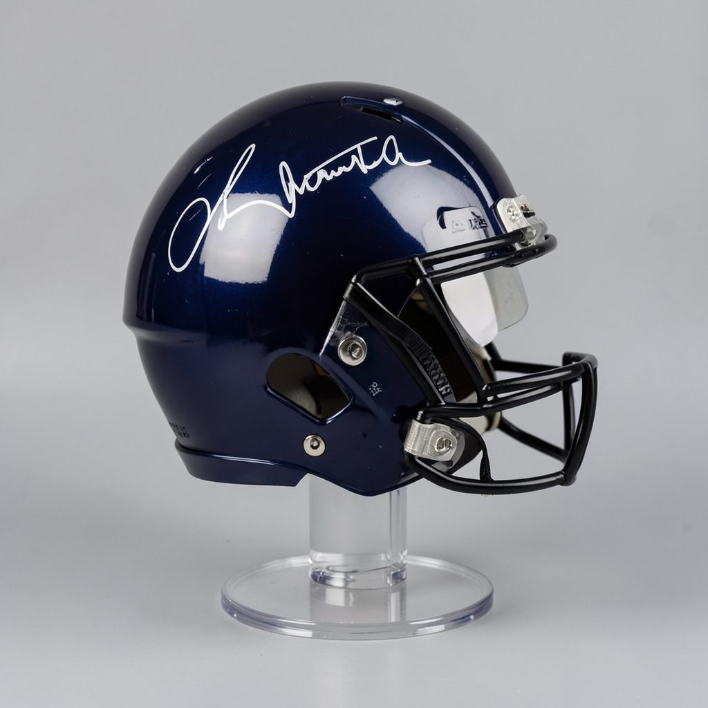 A glossy autographed football helmet displayed on a clear acrylic stand against a neutral gray background.